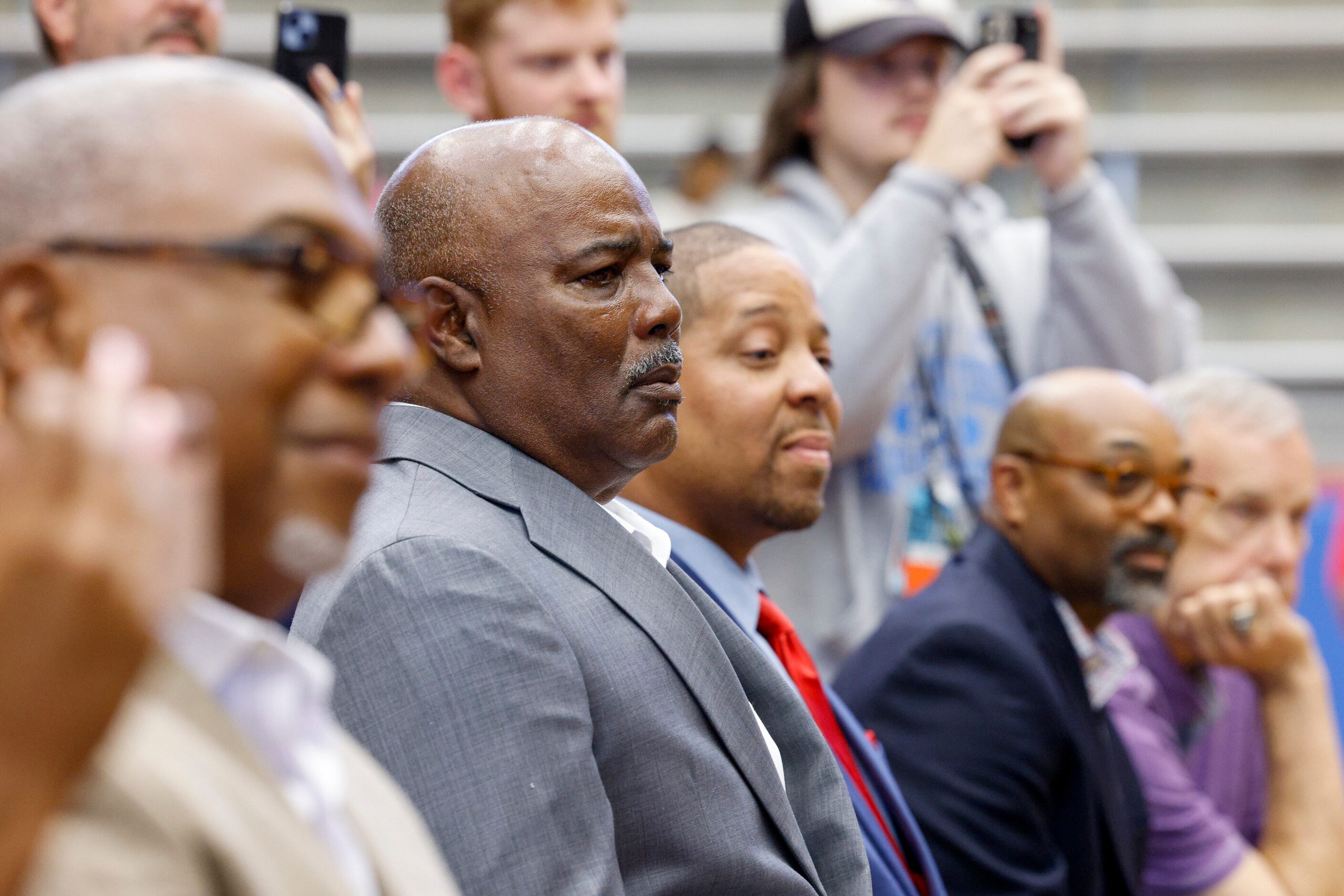 Duncanville head coach Reginald Samples watches as defensive lineman Colin Simmons announces...