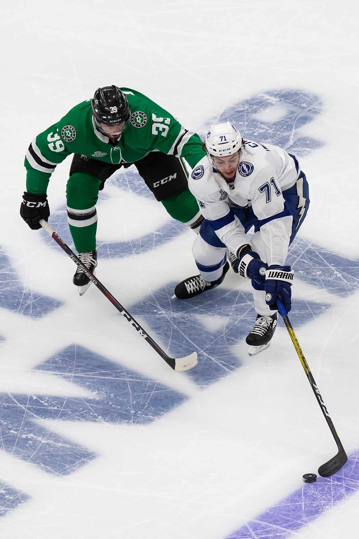 Joel Hanley (39) of the Dallas Stars battles against Anthony Cirelli (71) of the Tampa Bay...
