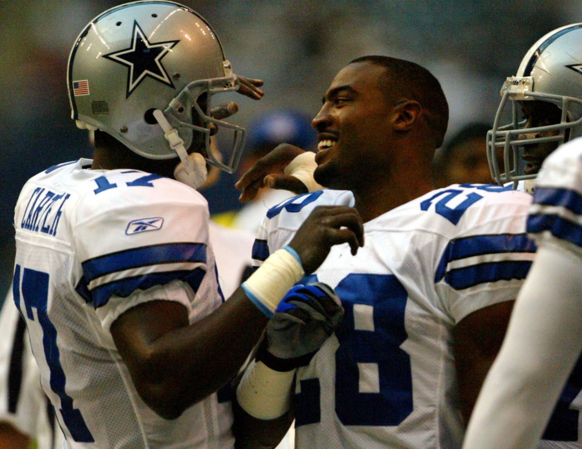 Darren Woodson of the Dallas Cowboys walking on the field during a