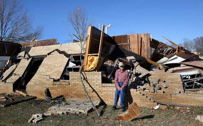 J.W. Skelton sat on what was a wall in front of Calvary Baptist Church in Ashland, Miss., on...