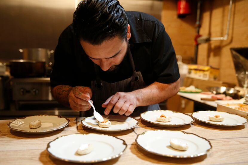Chef and owner Regino Rojas works on an appetizer in the Purepecha room at Revolver Taco...