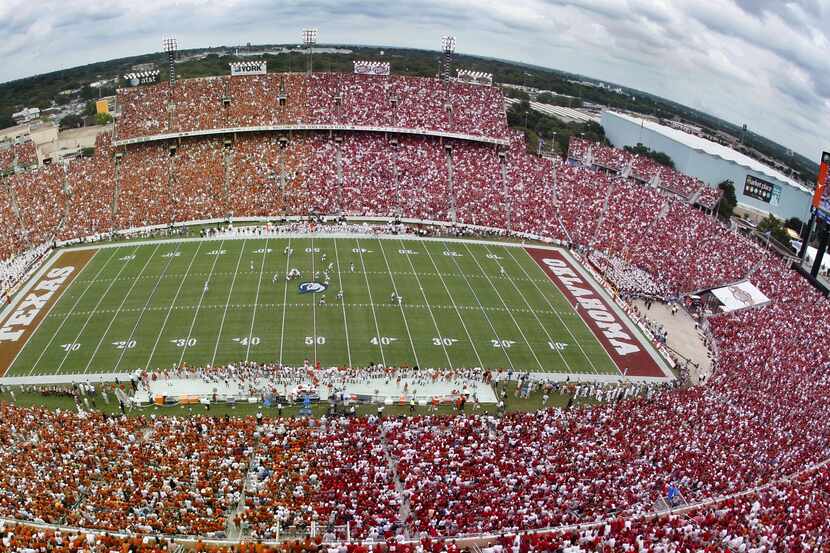 ORG XMIT: *S191B3562* The Cotton Bowl was divided at the 50 yard line as the Univeristy of...