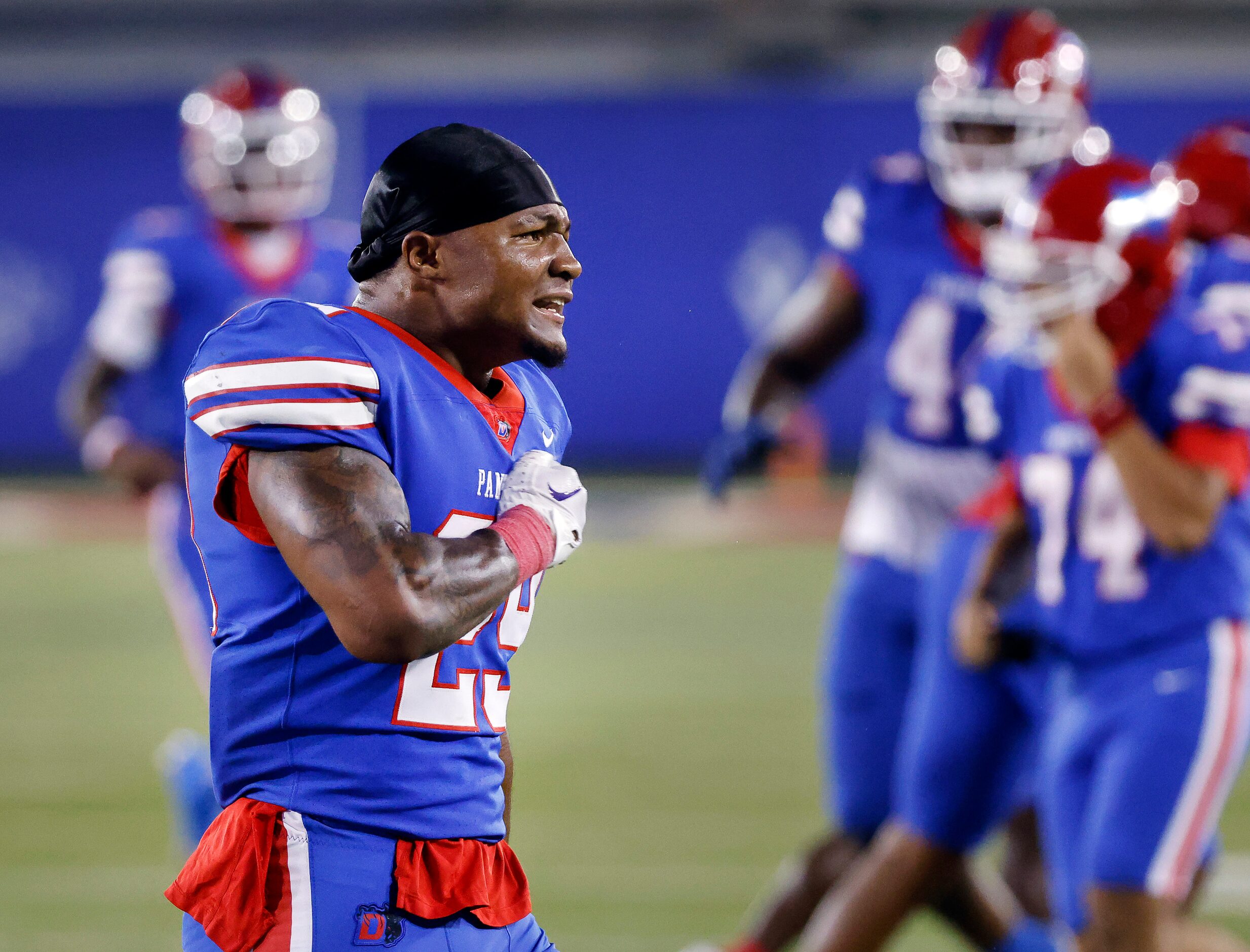 Duncanville running back Caden Durham (29) celebrates his first quarter touchdown against...