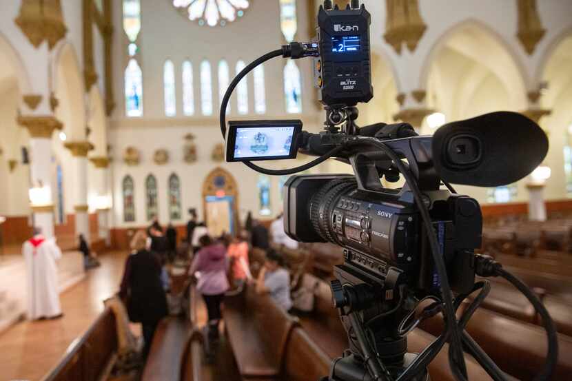 The Diocese of Dallas films Rev. Stephen Bierschenk pray the Stations of the Cross at the...