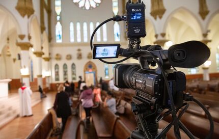 The ritual reading of the Stations of the Cross is conducted by Rev. Stephen Bierschenk at...