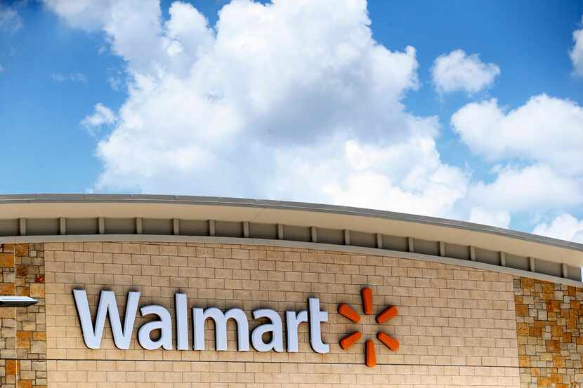 An exterior shot of the Walmart sign at Walmart at Timber Creek Crossing in Dallas.