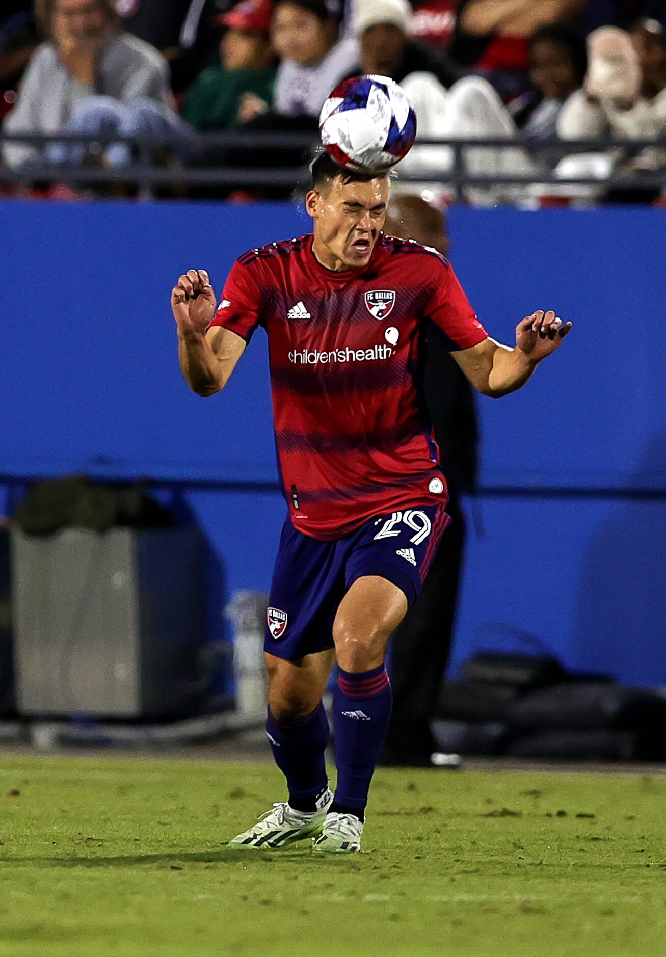 FC Dallas defender Sam Junqua heads the ball against Seattle during the first half in Game 2...