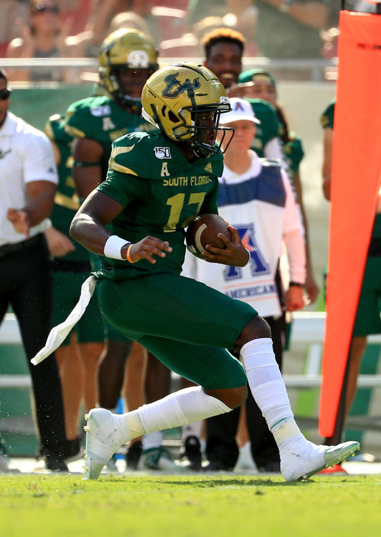 TAMPA, FLORIDA - SEPTEMBER 28:  Jordan McCloud #12 of the South Florida Bulls rushes during...