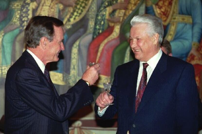 President George Bush and Russian President Boris Yeltsin raised a toast to "our New Year's...