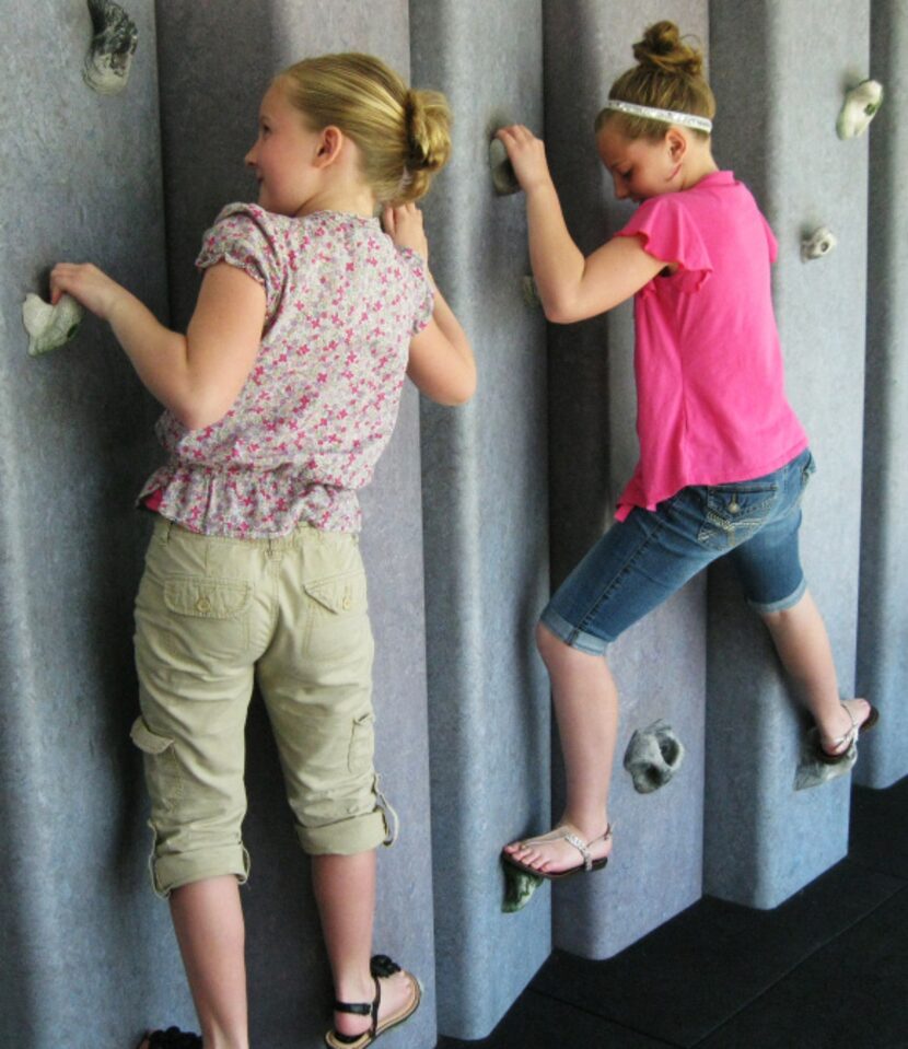 Two girls at the Children's Discovery Museum of the Desert, Rancho Mirage, Calif., test...