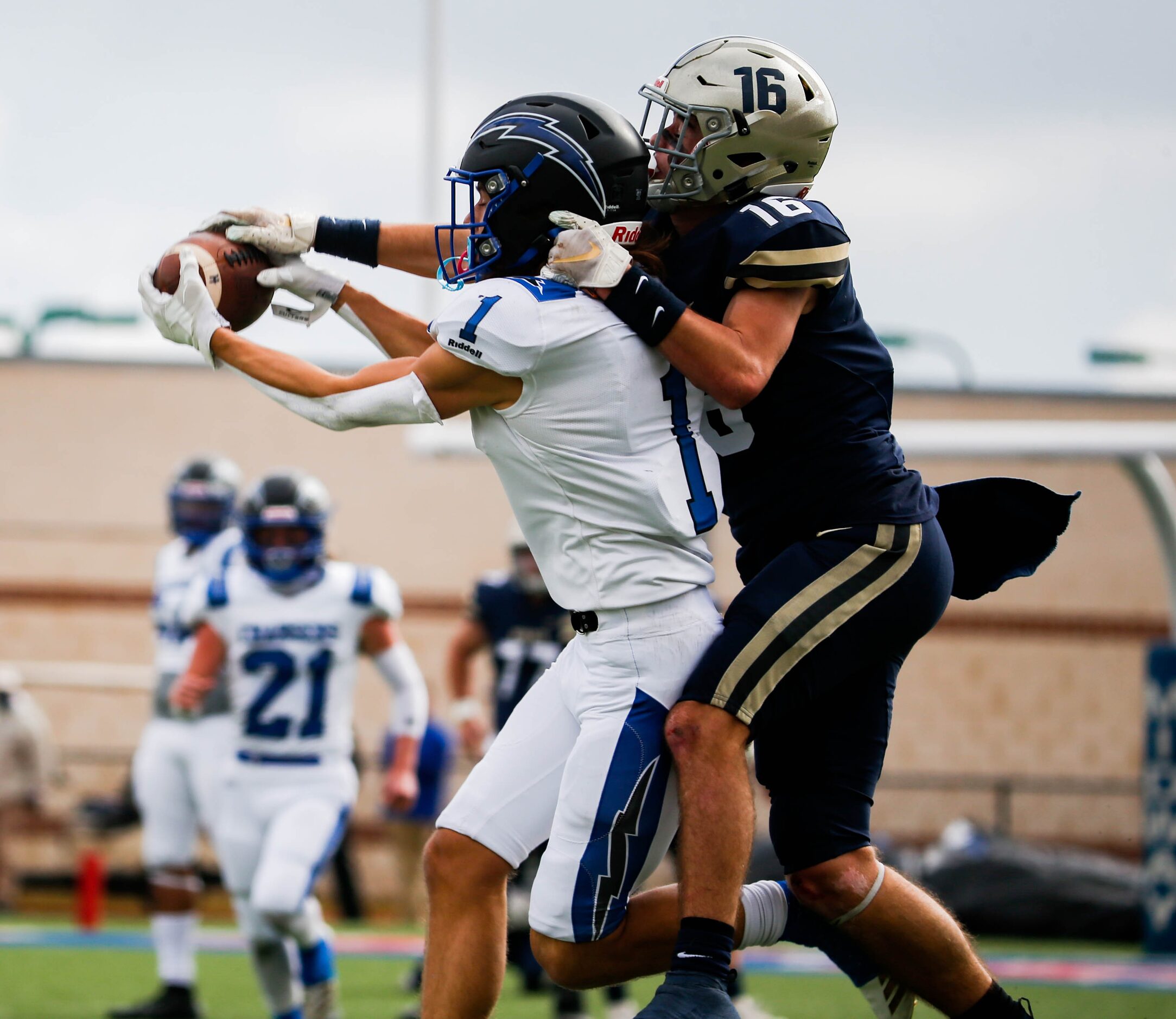 Dallas Christian's Garrett Tillett (1) intercepts the pass intended for Austin Regents'...