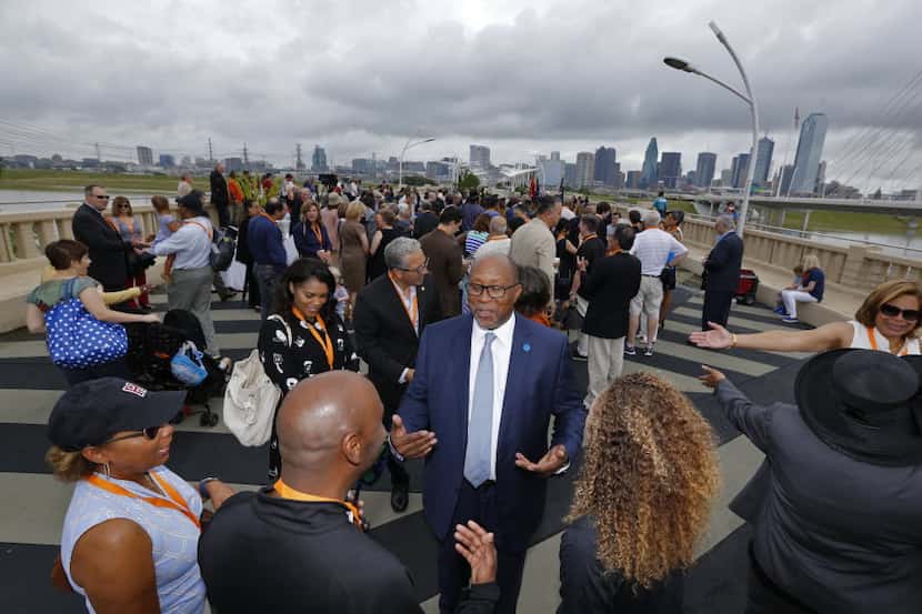  Ron Kirk spoke with supporters Saturday at a ceremony renaming a pedestrian bridge in the...