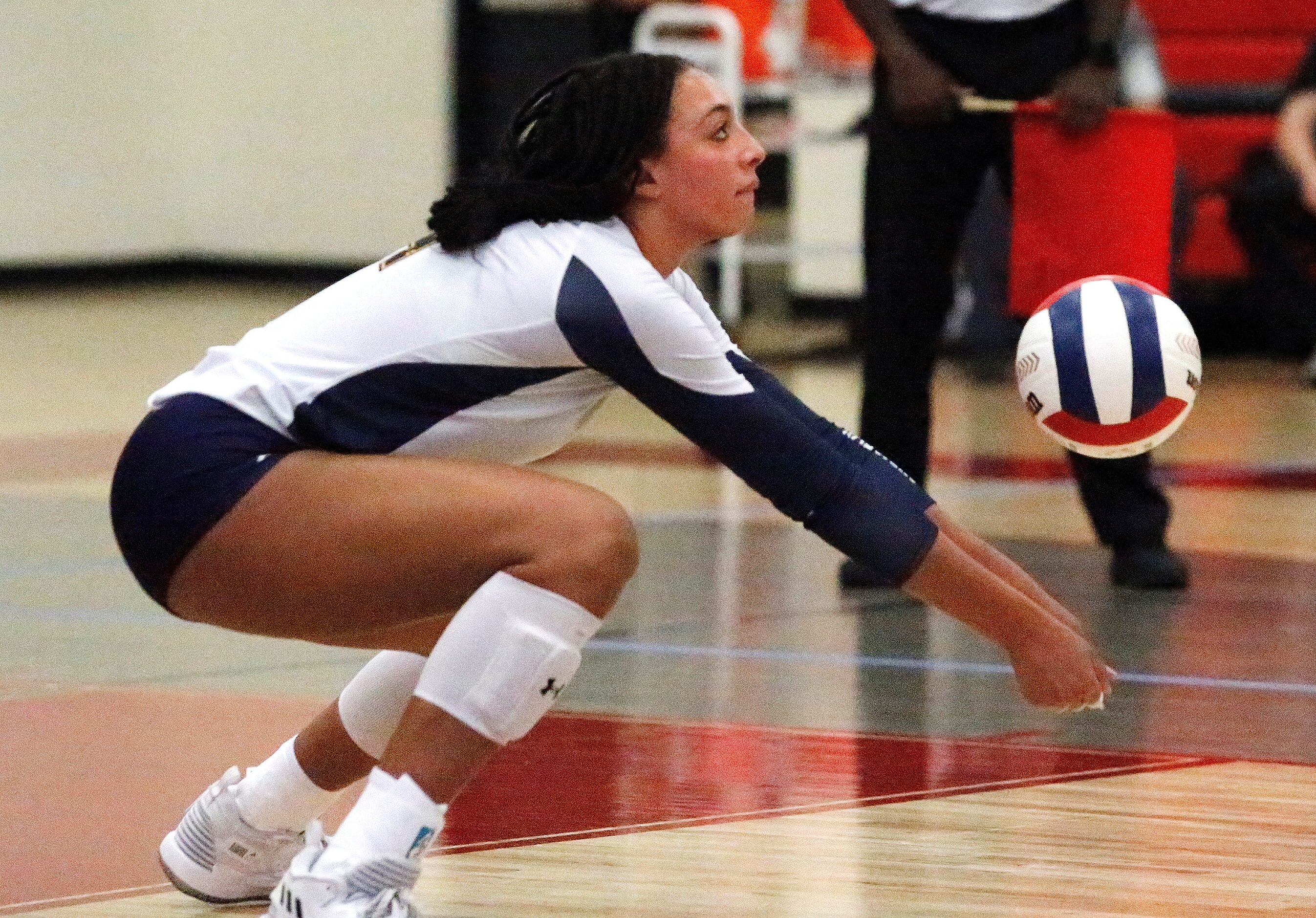 Prestonwood Christian Academy outside hitter Jadyn Livings (4) receives a serve in game one...