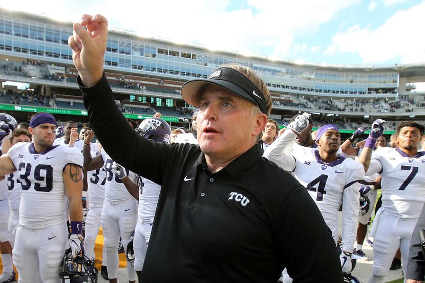 TCU head coach Gary Patterson celebrates the win against Baylor in an NCAA college football...