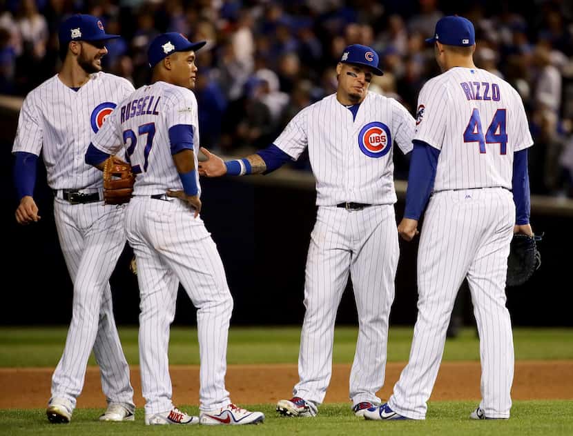 CHICAGO, IL - OCTOBER 18:  Kris Bryant #17, Addison Russell #27, Javier Baez #9, and Anthony...