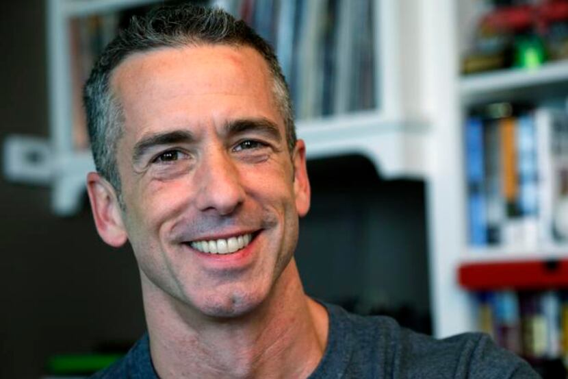 
In this photo taken on May 22, 2013, author Dan Savage is in his home in Seattle. Savage's...