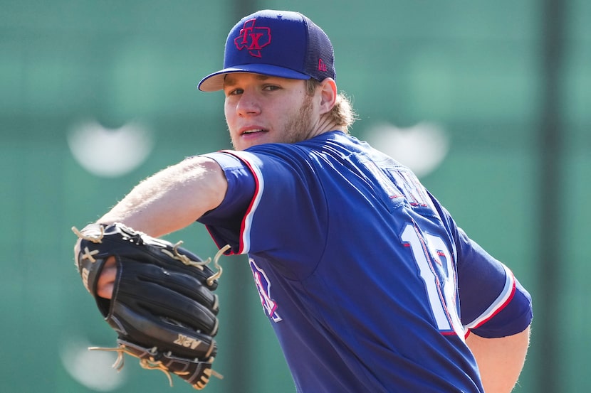 Pitcher Zak Kent participates in a drill during a Texas Rangers minor league spring camp...