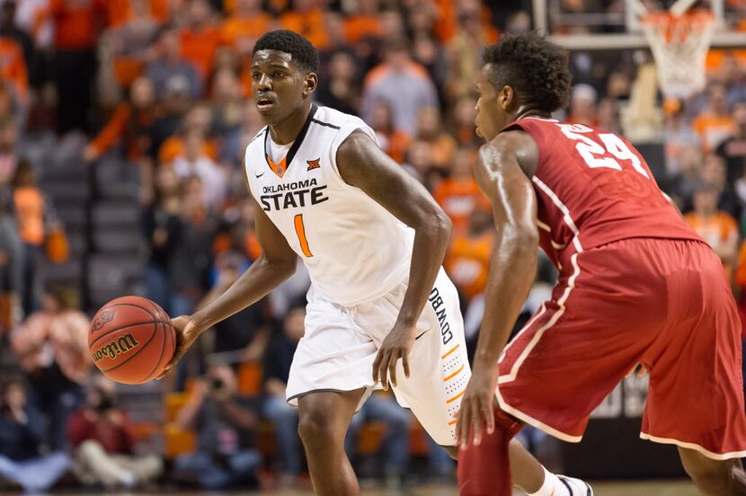 Jan 13, 2016; Stillwater, OK, USA; Oklahoma State Cowboys guard Jawun Evans (1) dribbles the...