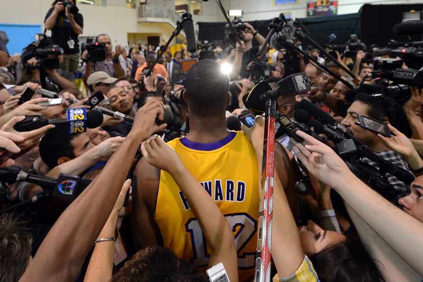 EL SEGUNDO, CA - OCTOBER 01:  Dwight Howard #12 of the Los Angeles Lakers speaks to members...