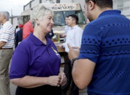  Houston Mayor Annise Parker, left, greets a supporter at a fund raiser for the Houston...