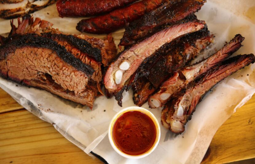 A tray full of brisket, ribs and sausage at John Mueller Meat Co.