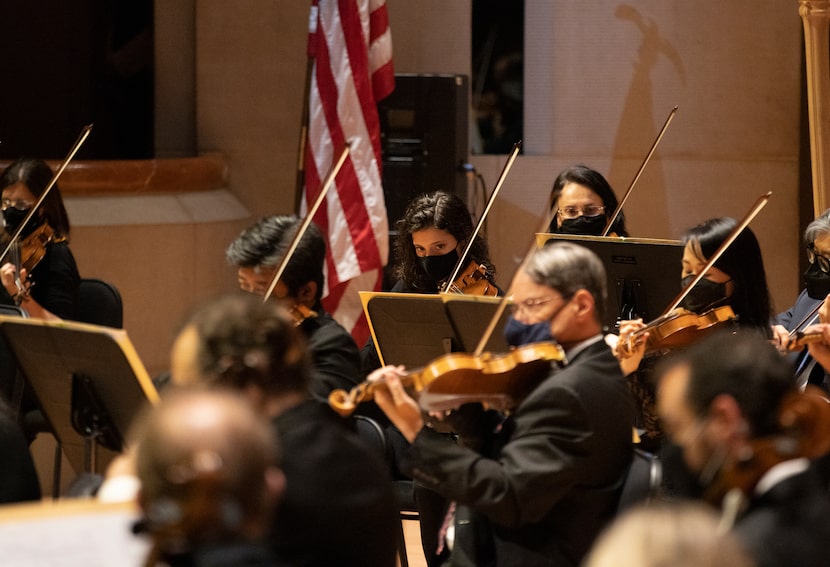 Mariana Cottier-Bucco (center back), played in the violin section of the Dallas Symphony...