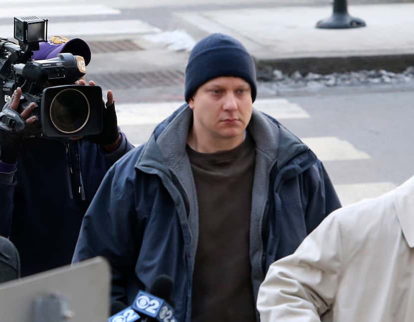 Chicago police officer Jason Van Dyke, accused of fatally shooting a black teenager, arrives...