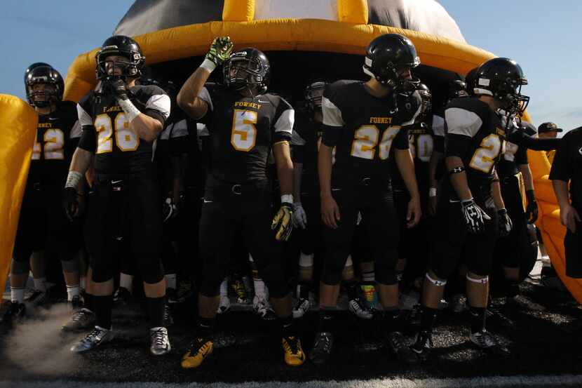 TXHSFB Forney players prepare to take the field before the start of the football game...