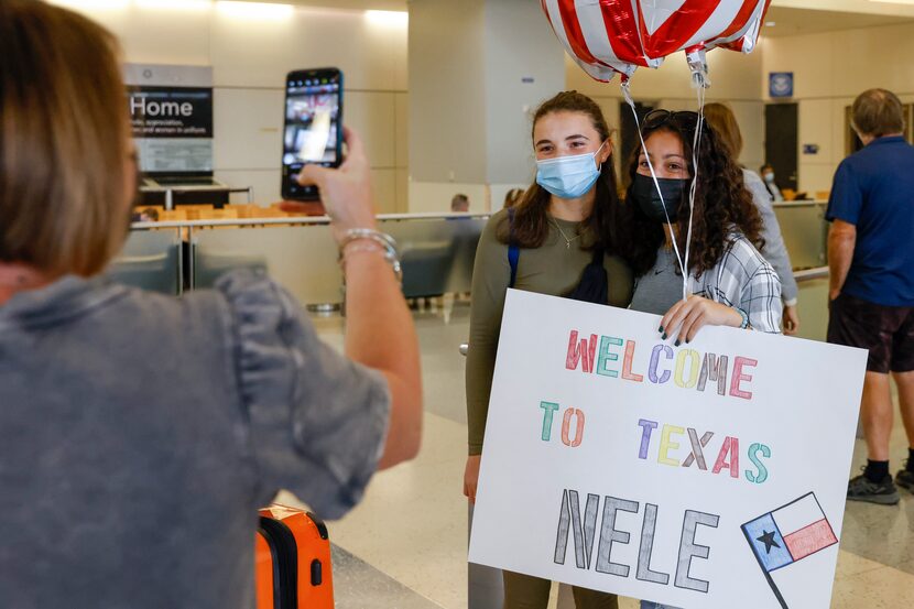 Lilliana Jimenez, 15 (left), and Nele Zentel, 15, of Tübingen, Germany, pose for a picture...