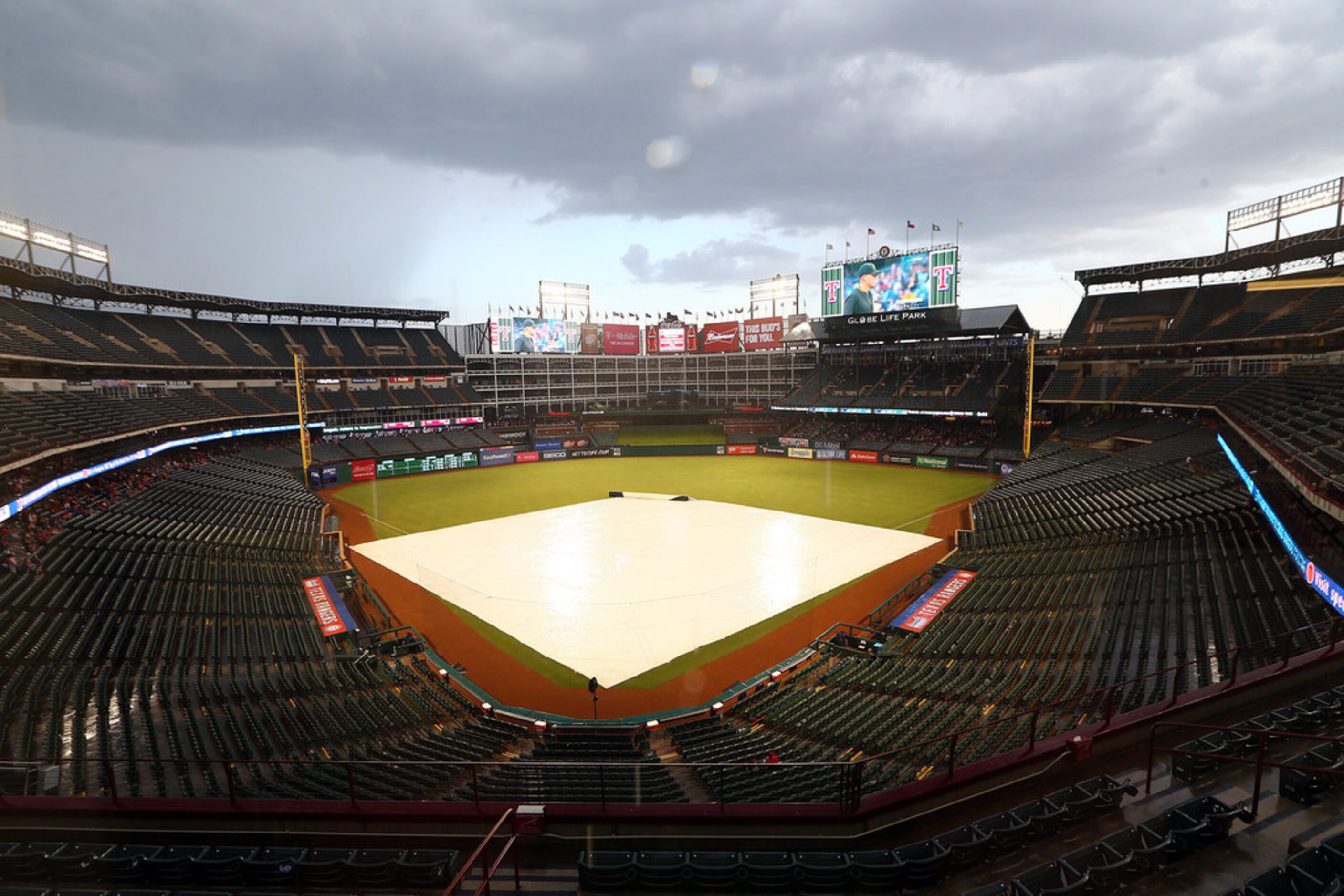 ARLINGTON, TX - AUGUST 18:  A view of the field during a rain delay prior to the game...