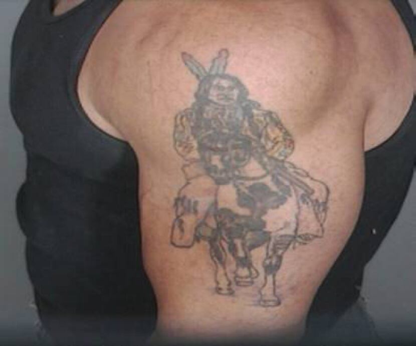 Alberto Morales' had a tattoo of an American Indian on a horse on his left shoulder.
