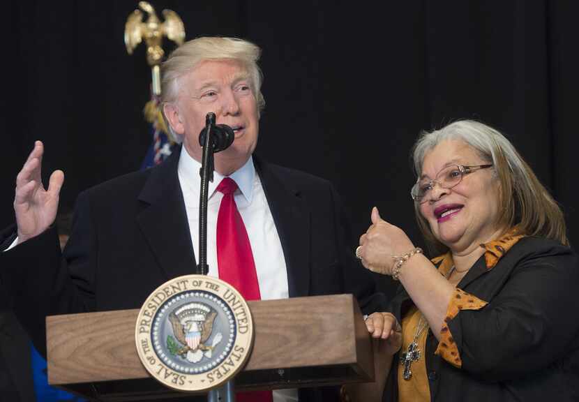 US President Donald Trump speaks as Alveda King (R), niece of civil rights icon Dr. Martin...