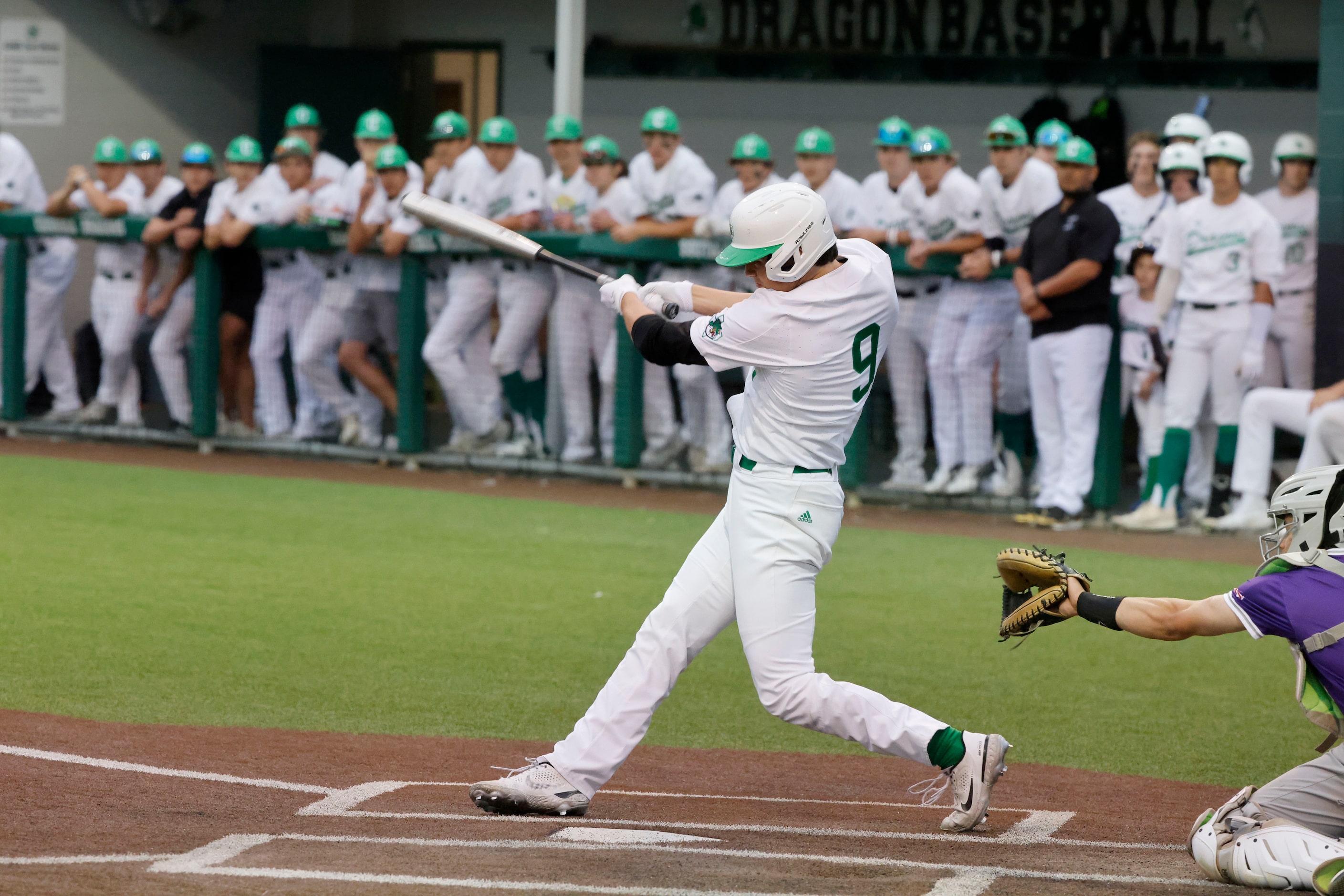 Southlake’s Owen Proksch (9) hits a solo hot run against Keller Timber Creek during the...