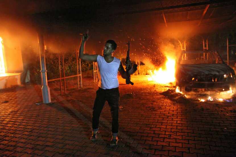 Buildings and cars were set afire inside the U.S. Consulate compound in Benghazi on Sept....