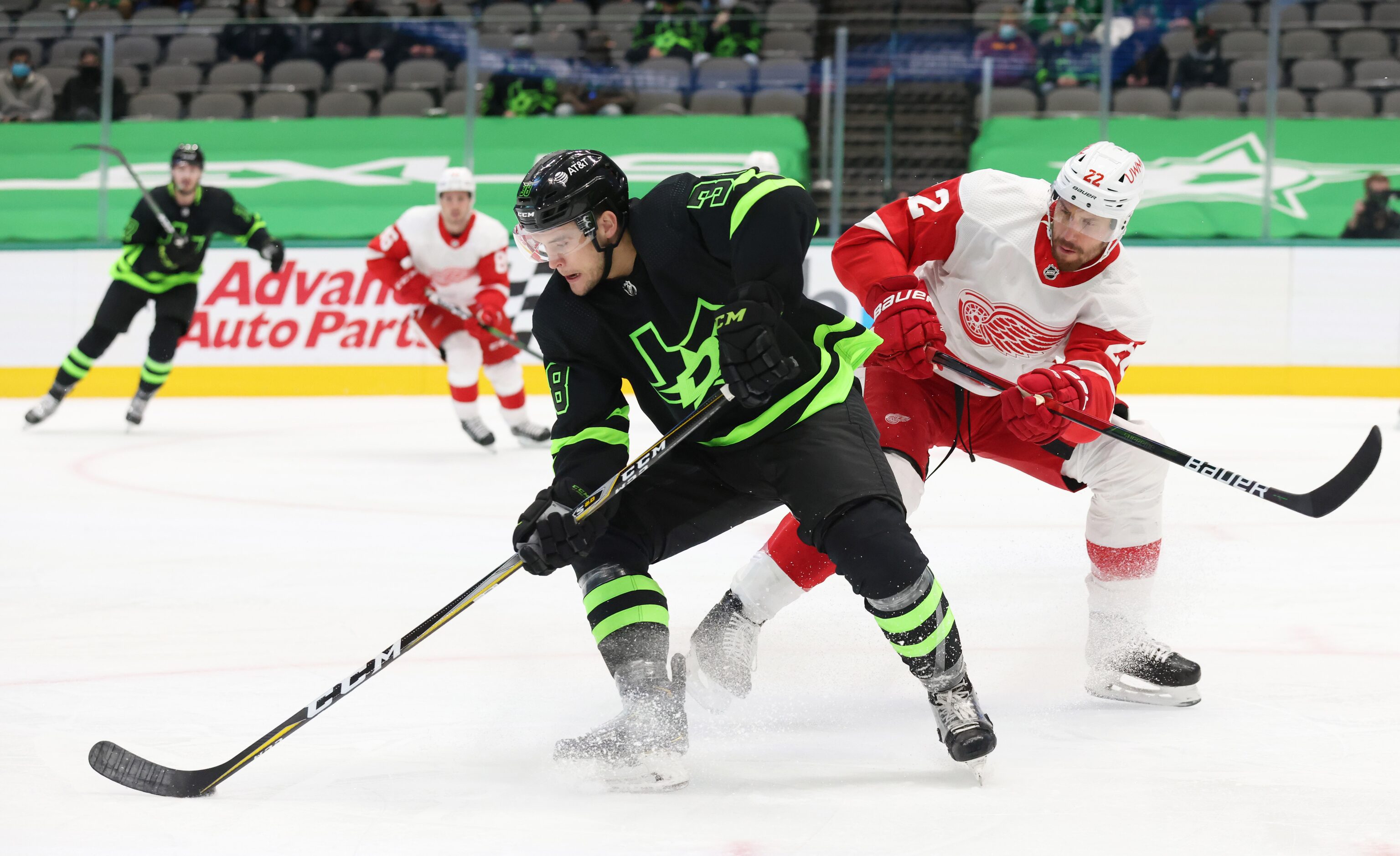 Dallas Stars Joel L'Esperance (38) spins around Detroit Red Wings defenseman Patrik Nemeth...