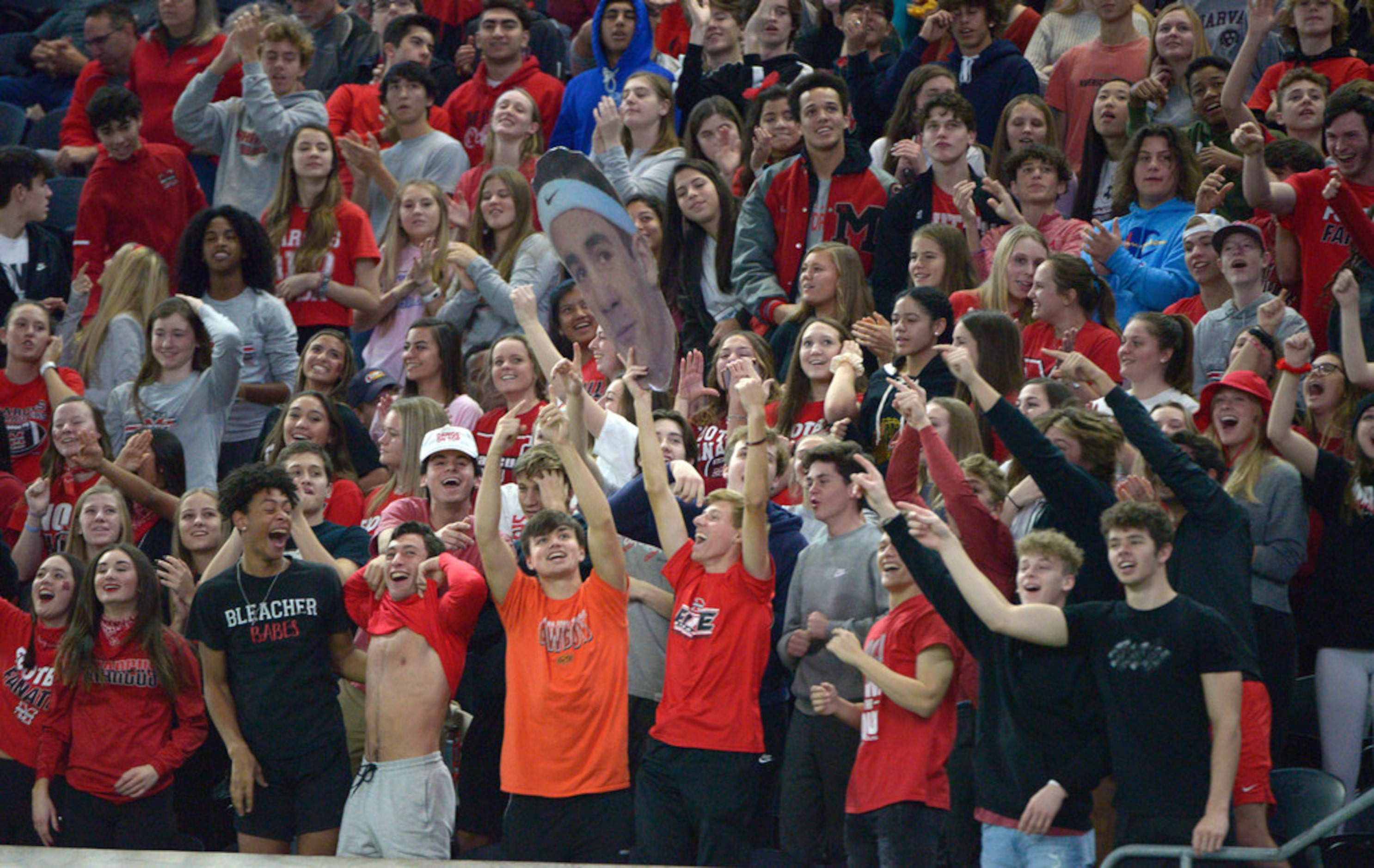 Flower Mound Marcus' students cheer in the second half of a Class 6A Division II area round...