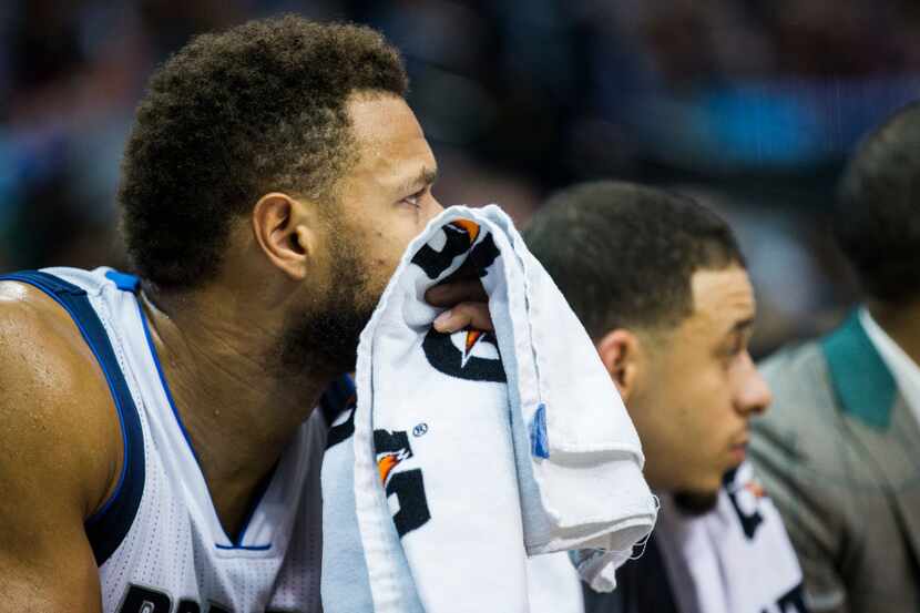 Dallas Mavericks guard Justin Anderson (1) watches from the bench during the second quarter...