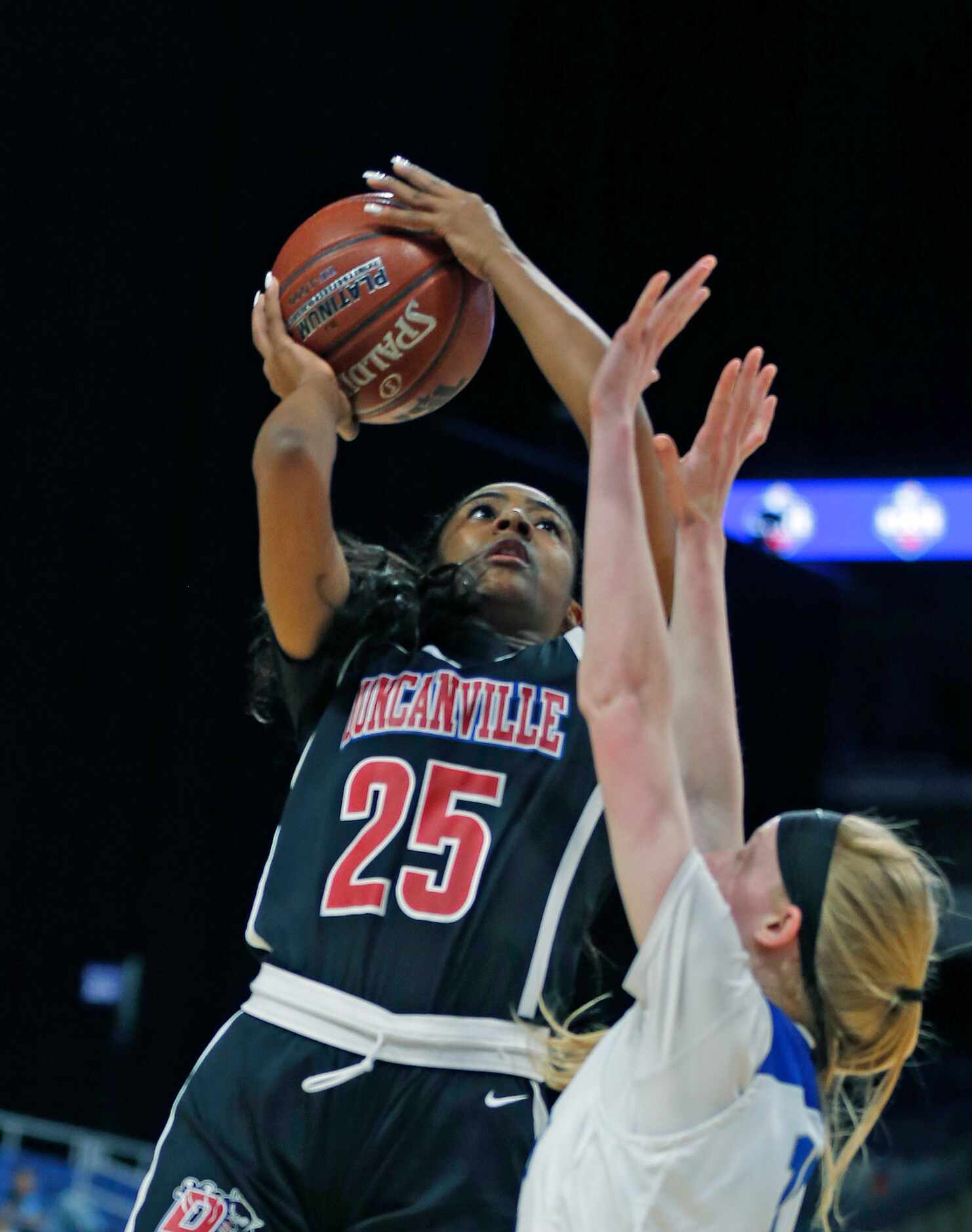 Duncanville guard Deja Kelly #25 shoots for two in a 6A final on  Saturday, March 7, 2020 at...