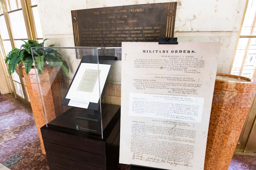 An enlarged photo copy of Gen. Gordon Granger's announcement that slaves were freed, two...