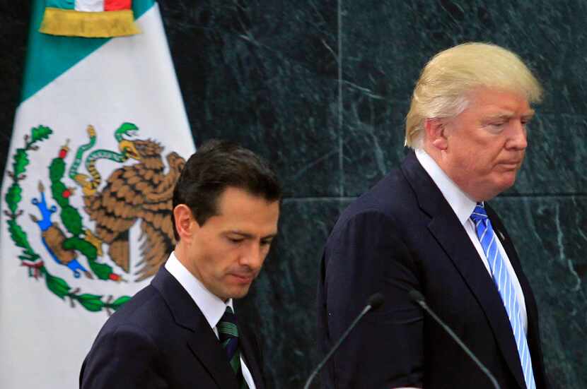 President Trump, right, with Mexican President Enrique Pena Nieto after their Aug. 31, 2016,...