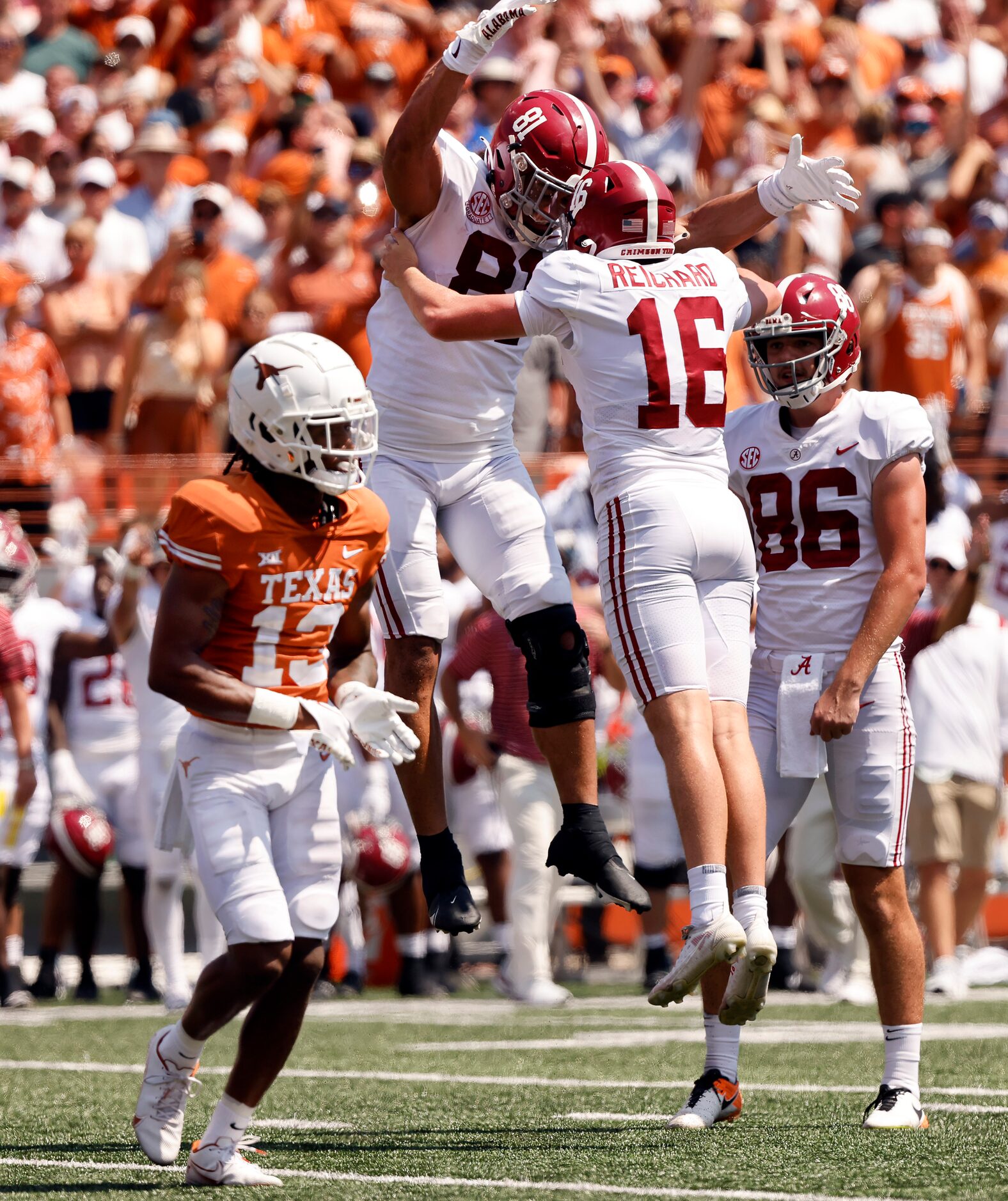 Alabama Crimson Tide tight end Cameron Latu (81) congratulates place kicker Will Reichard...