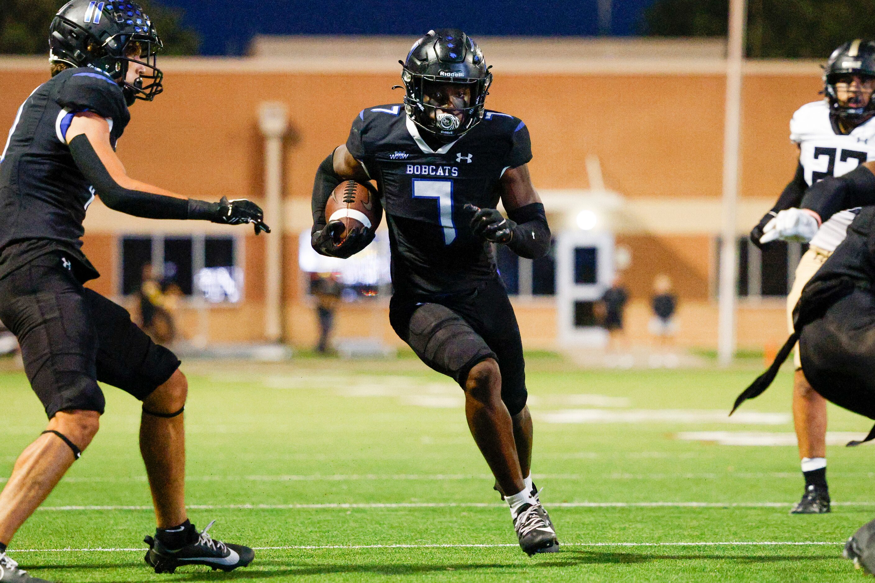 Trophy Club Byron Nelson David Kabongo (7) returns a punt during the first half of a game...