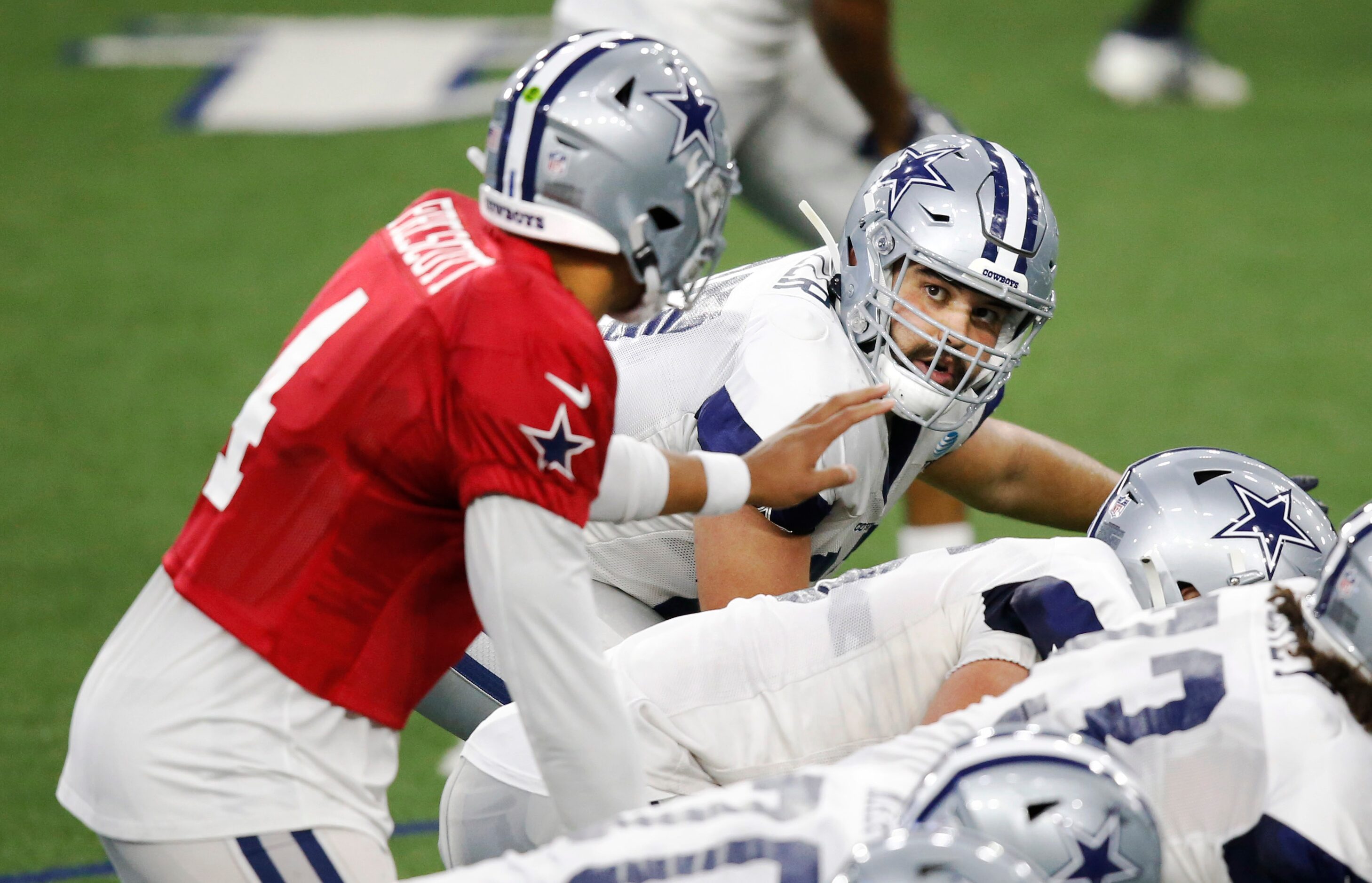 Dallas Cowboys quarterback Dak Prescott (4) communicates with Dallas Cowboys offensive...