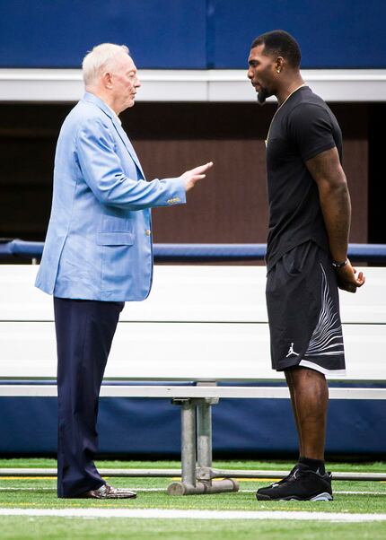 Dallas Cowboys wide receiver Dez Bryant (right) talks with team owner Jerry Jones on the...