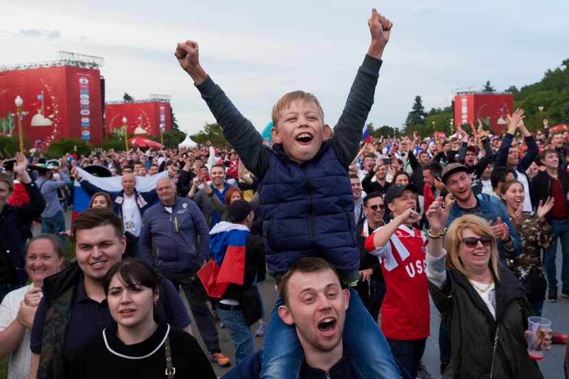 Soccer fans from across the globe gather at the official FIFA Fan Fest at Moscow State...