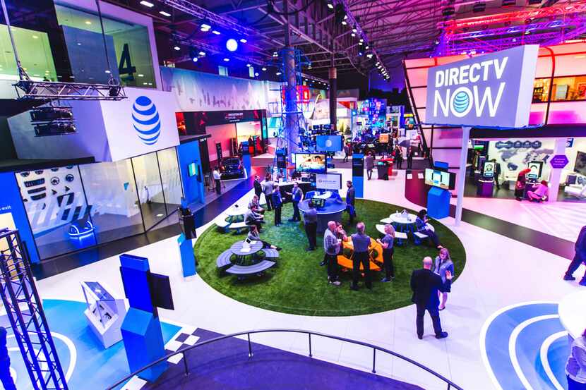 An undated photo of an AT&T and DirecTV NOW booth at a Mobile World Congress show. Mobile...