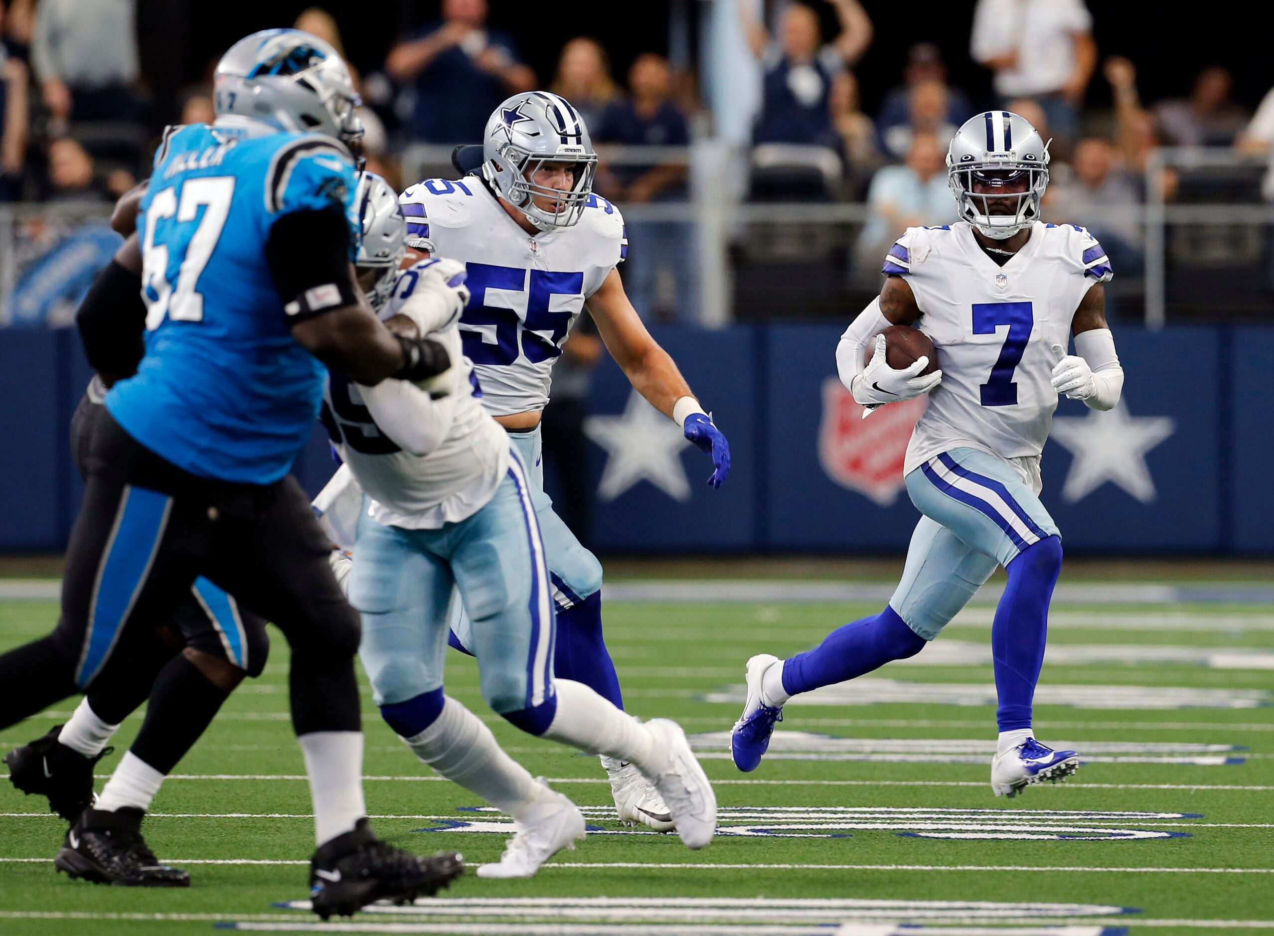 Dallas Cowboys cornerback Trevon Diggs (7) returns the ball, after making an interception...