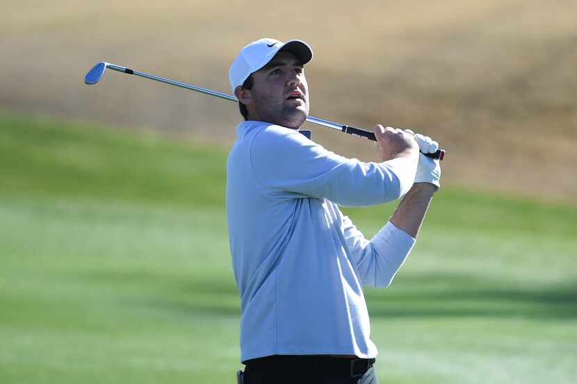 LA QUINTA, CALIFORNIA - JANUARY 18: Scottie Scheffler plays his shot during the third round...