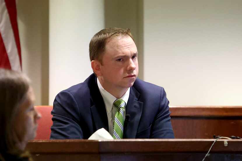 Defendant Aaron Dean takes the stand to testify on Monday, Dec. 12, 2022, during his trial...