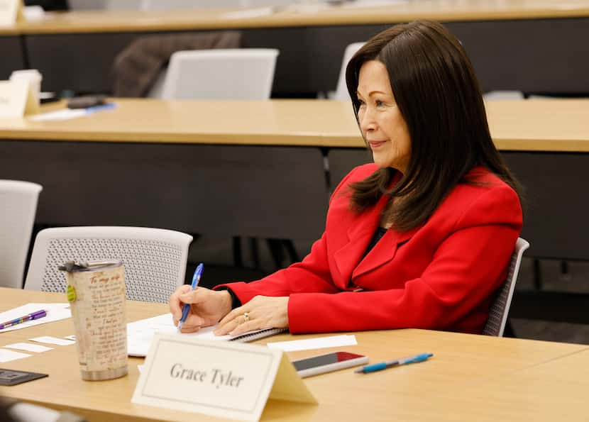 Grace Tyler listens during a meeting of Texas Dragon Toastmasters Club at the University of...